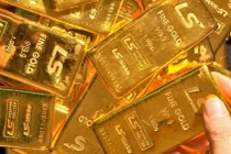 Vàng thế giới vượt mốc 1.600 USD/oz, cao nhất 7 năm