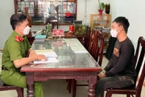 Nguyễn Văn Hậu tại cơ quan công an.