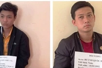 Vy và Đạt (bên phải) khi bị bắt giữ. 