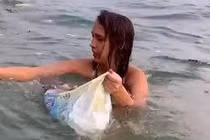 Tổng Thư ký Hội BVTN&MT Việt Nam cảm ơn cô gái Nga nhặt rác khi tắm biển Phú Quốc