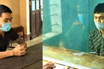 2 nghi phạm Trần Viết Lợi và Trần Văn Quý tại cơ quan công an (ảnh: Công an tỉnh Thừa Thiên Huế).