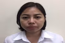 Đinh Thị Quỳnh tại cơ quan công an (ảnh: Công an TP Hà Nội).