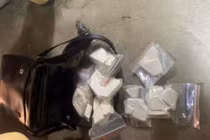 1,1 kg heroin  trong túi xách của Trần Văn Khánh