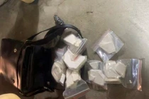 1,1 kg heroin  trong túi xách của Trần Văn Khánh
