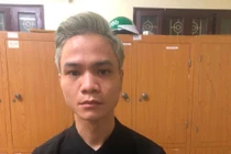 Nghi phạm Phùng Văn Vinh tại cơ quan công an.