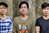 Các bị can Hoàng Văn Bình, Vũ Thanh Tùng và Lã Văn Hoài tại cơ quan công an (từ trái qua).