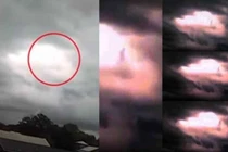 Kỳ quái hình người đứng khổng lồ trên đám mây