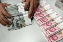 Trung Quốc tiếp tục hạ giá nhân dân tệ