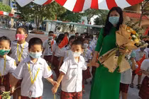 Trẻ tiểu học và lớp 6 Hà Nội đến trường học trực tiếp từ 21/2