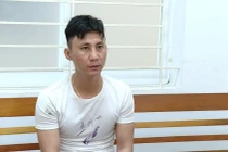 Trương Quang Sỹ tại cơ quan công an.