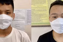 Hai đối tượng từ trái qua: Trịnh Quang Huy và Lưu Huy Tập tại cơ quan công an.