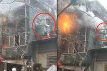 Vụ "người hùng" cứu em bé khỏi đám cháy: Tia lửa điện tóe ra từ ổ cắm nồi cơm