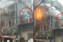 Vụ "người hùng" cứu em bé khỏi đám cháy: Tia lửa điện tóe ra từ ổ cắm nồi cơm