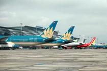 Không nên áp sàn giá vé máy bay 