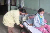 Bỏ điều trị bệnh cho con có vi phạm pháp luật?