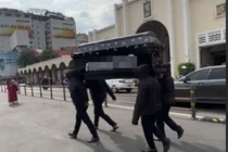 Luật sư nói gì vụ nhóm người khiêng quan tài diễu phố ở TPHCM?