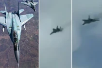 MiG-29 (bên trái) và MiG-29 bay trên bầu trời Tehran vào ngày 28 tháng 2.