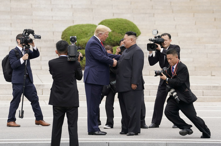 U.S. President Trump and North Korean leader Kim Jong Un meet at the Korean Demilitarized Zone