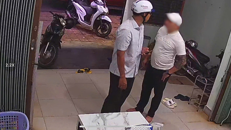 Đối tượng T. (bên phải) đã bị cơ quan Công an triệu tập. Ảnh: CTV