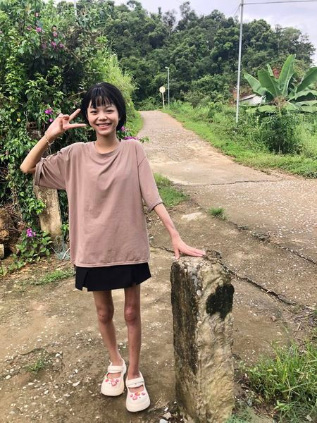 Hồng Thu đã chiến thắng căn bệnh quái ác trở về bản làng - Ảnh BVCC Hồng Thu đã chiến thắng căn bệnh quái ác trở về bản làng - Ảnh BVCC