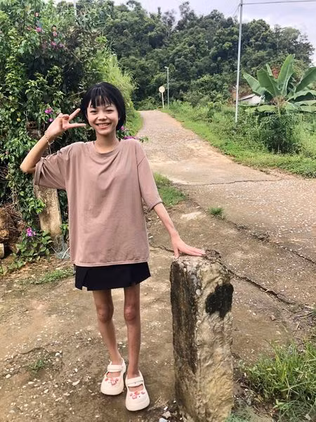 Hồng Thu đã chiến thắng căn bệnh quái ác trở về bản làng - Ảnh BVCC