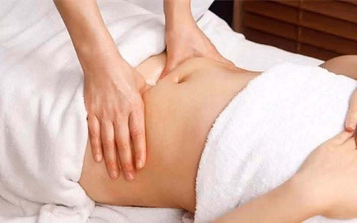 Xoa huyệt giảm béo lấy lại vóc dáng sau Tết - Ảnh Minh họa