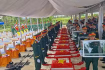 Truy điệu và an táng 12 hài cốt liệt sĩ tại Nghĩa trang Liệt sĩ quốc gia Đường 9