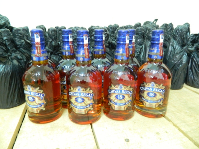 Kinh doanh ruou lau, nguoi dan ong o Quang Tri bi phat 90 trieu