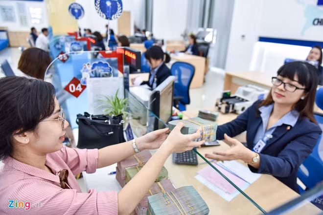 Vi sao chi duoc huong them 300% luong 5 trong so 7 ngay nghi Tet? hinh anh 1 pho_bank_zing_5.jpg