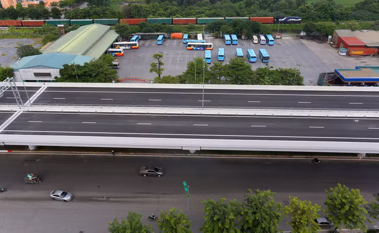 Đường Phạm Văn Đồng mở rộng thành 12 làn xe ảnh 11