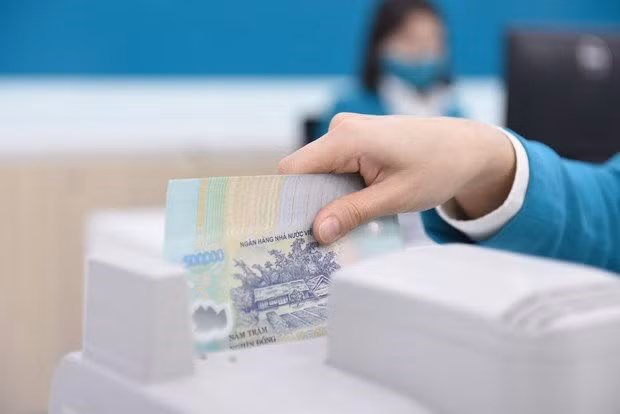 Huy dong 36.200 ty dong qua kenh trai phieu Chinh phu trong thang Tam hinh anh 1
