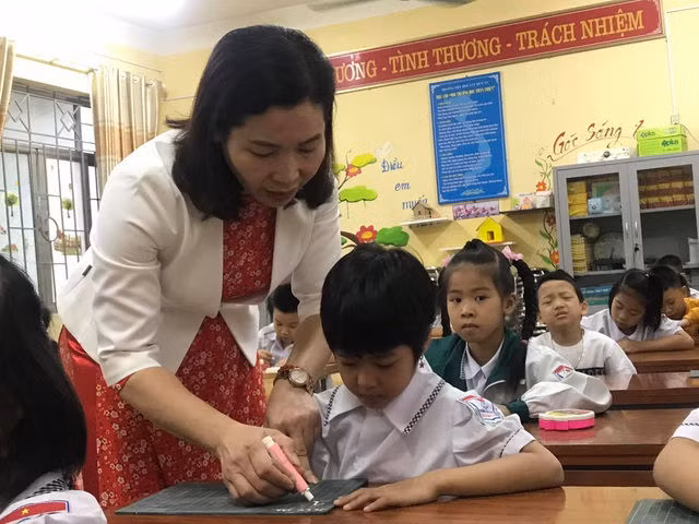 Quy định hạng, thăng hạng không tốt sẽ ảnh hưởng đến lương giáo viên - 1