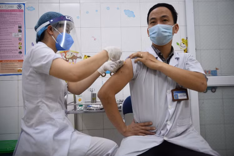 Khi nao Viet Nam dat mien dich cong dong? hinh anh