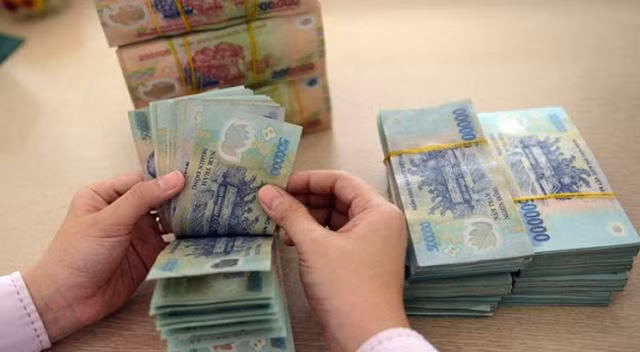 Giao dịch bất động sản từ 300 triệu đồng tiền mặt phải báo cáo Bộ Xây dựng - 1