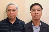 Các bị can Mai Tuấn Anh (trái) và Trần Văn Tám.